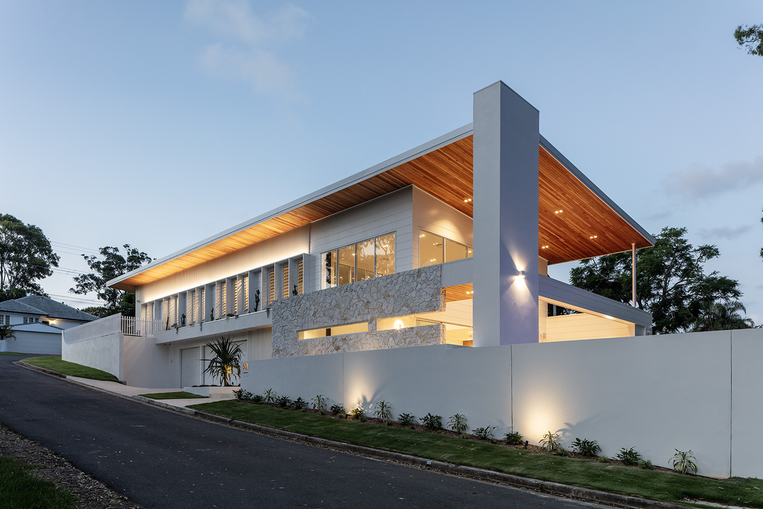HNT Builders custom luxury home, 50 Canopus Street, Coorparoo, photographed at dusk